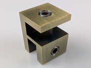 Overpanel bracket in Antique brass